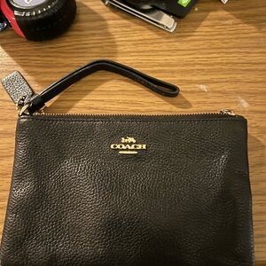 Coach Black Leather Pouch with Gold Logo
